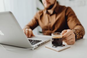 1 a person working on a laptop