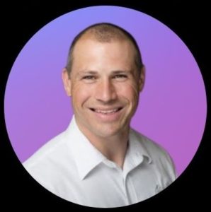 6 Martin Boonzaayer of Trusted Home Buyer in a white shirt on a purple and blue ombre circle frame on a black background