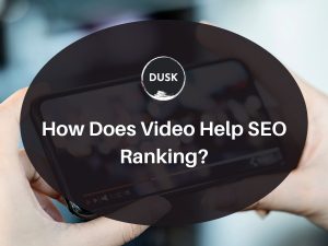 3 Front image of a blog titled "How does video Help SEO Ranking" with a person using his phone to watch a video as the background and the title displayed in corporate typography