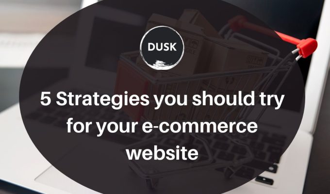 Dusk d (4) Front image of a blog titled "5 strategies you should try your e-commerce website "with ppc infographic photo illustration as the background and the title displayed in corporate typography
