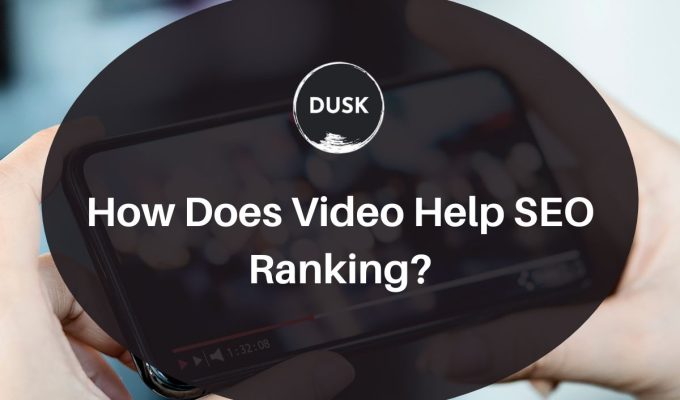 Front image of a blog titled "How does video Help SEO Ranking" with a person using his phone to watch a video as the background and the title displayed in corporate typography